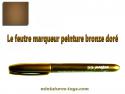 Un feutre de type marqueur pour peindre ou retoucher le doré de vos miniatures