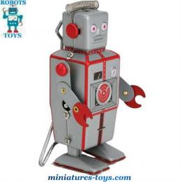 Un robot Lilliput qui est un jouet de style ancien vintage reproduit en métal