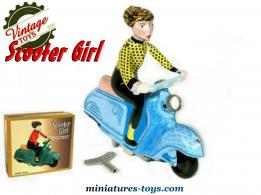 Le Scooter bleu a la jeune fille en miniature façon jouet en métal ancien vintage