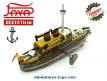 Le bateau de guerre cuirassé mécanique miniature en métal style jouet ancien