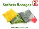 Un ensemble de 5 sachets de flocage pour réseaux de trains décors et dioramas