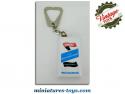 Un porte clefs publicitaire des produits lustrants de sol Simoniz
