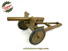 Le gros canon tirant de 105 en miniature du type jouet en tôle