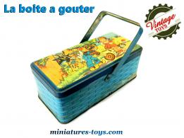 Le panier boite à gouter ancien en metal bleu sérigraphié avec un dessin de Bozz