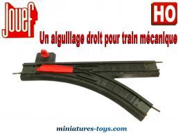 Un aiguillage droit avec ballast plastique pour train mécanique Jouef au HO