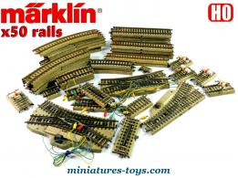 Un lot de 50 rails ferroviaires en métal 3 voies de Marklin au H0 HO état moyen