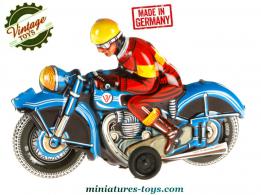 La moto miniature allemande bleue en métal réalisée a la façon d'un jouet ancien