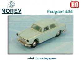 La Peugeot 404 berline bleue miniature de Micro Norev au H0 HO 1/86e