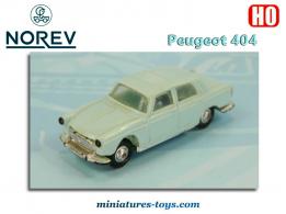 La Peugeot 404 berline bleue miniature de Micro Norev au H0 HO 1/86e