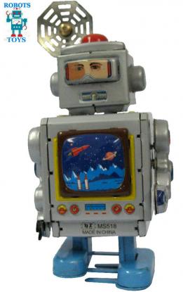 Un jouet mécanique vintage de l'astronaute réparateur de robots en métal