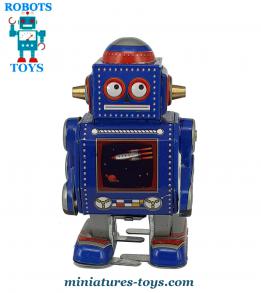 Le petit robot jouet bleu de style ancien vintage reproduit en métal