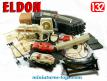 Le circuit de courses automobiles électrique miniature par Eldon USA au 1/32e