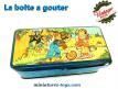 Le panier boite à gouter ancien en metal bleu sérigraphié avec un dessin de Bozz