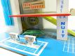 Le garage station services multi niveaux en miniature jouet années 1970 par Kad