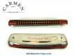 Un harmonica en métal et bois de marque Carmen made in Poland