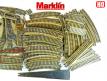 Un lot de 82 rails ferroviaires en métal 3 voies de Marklin au H0 HO