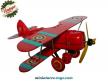 Un avion biplan type Curtiss rouge du style jouet ancien en métal