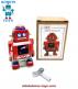 Le petit robot jouet rouge de style ancien vintage reproduit en métal