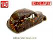 La voiture miniature en tôle de marque inconnue incomplète au 1/43e